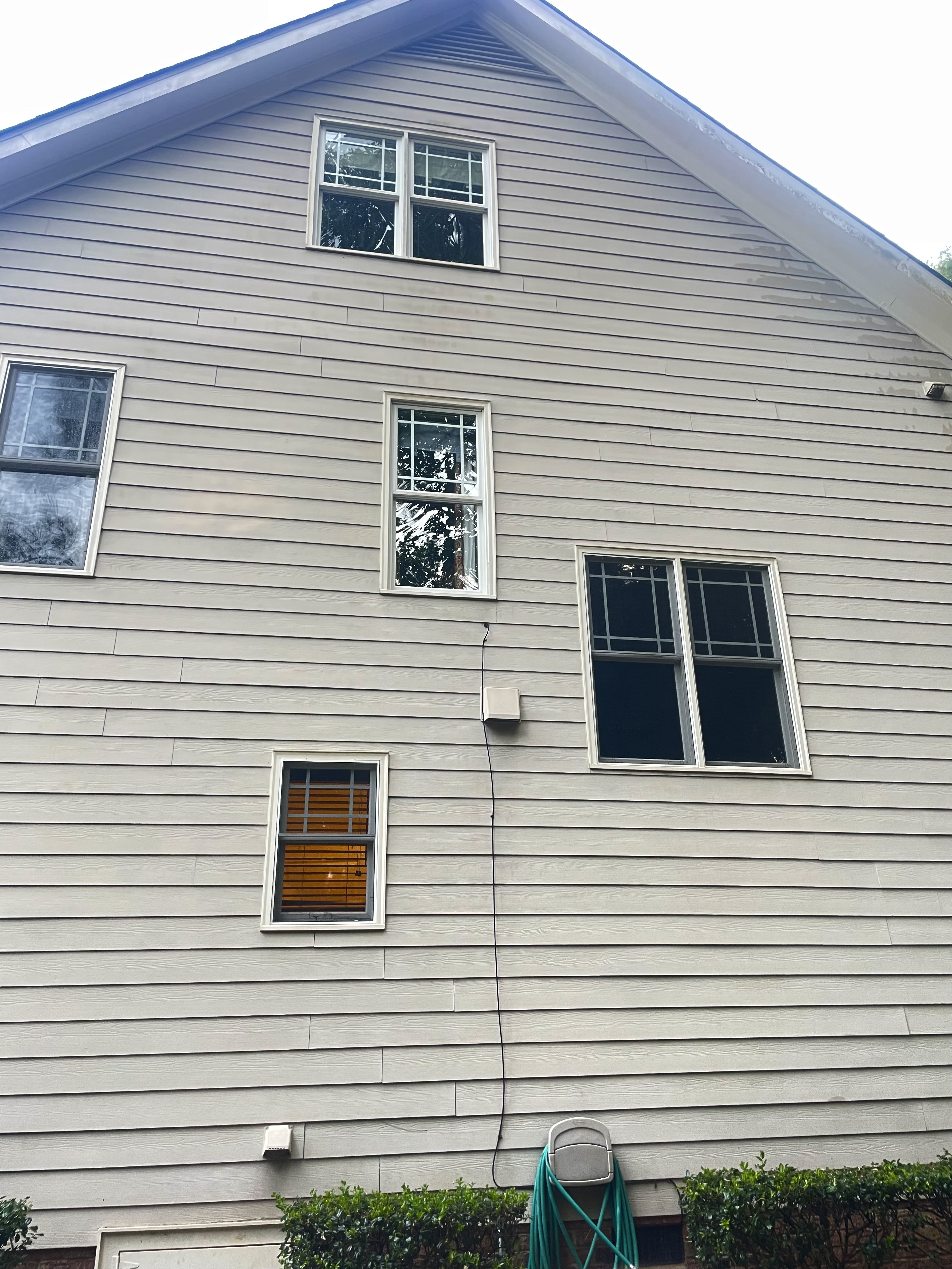 Clean home siding after soft washing in Wake Forest NC