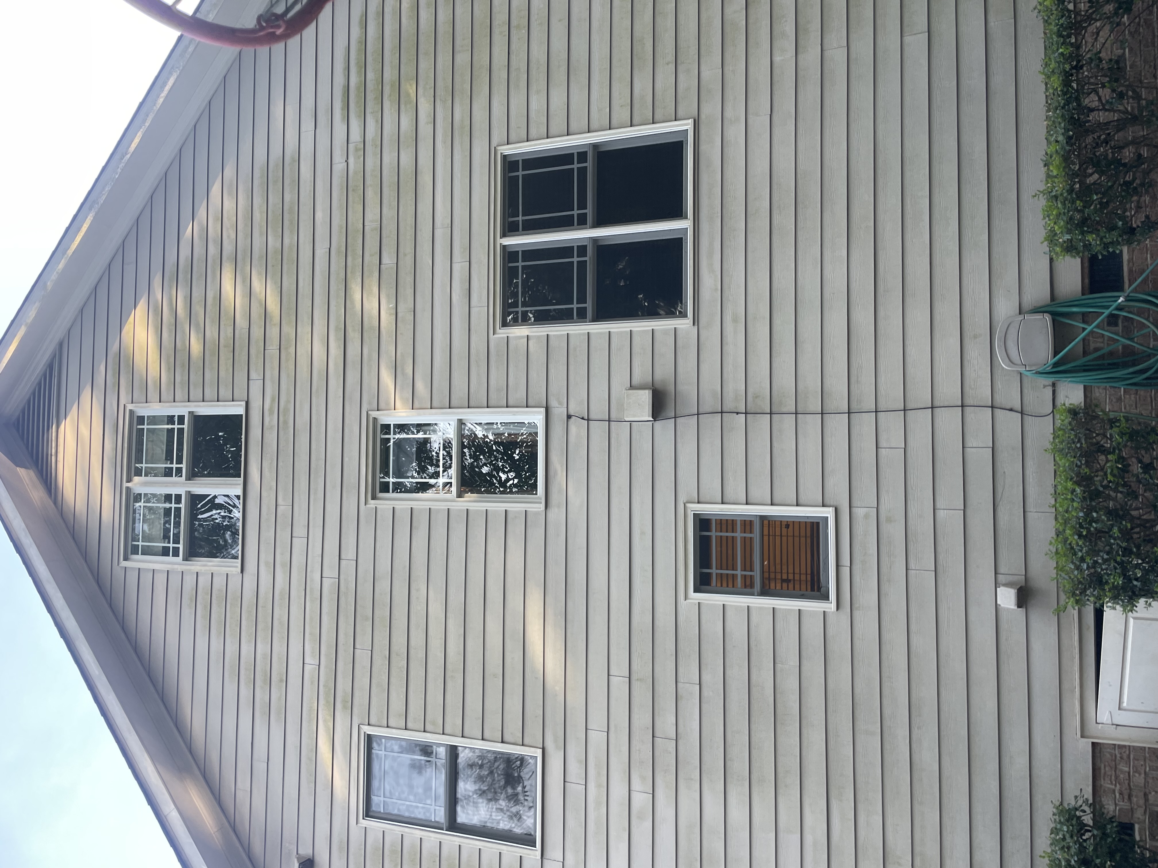 Home siding before soft washing